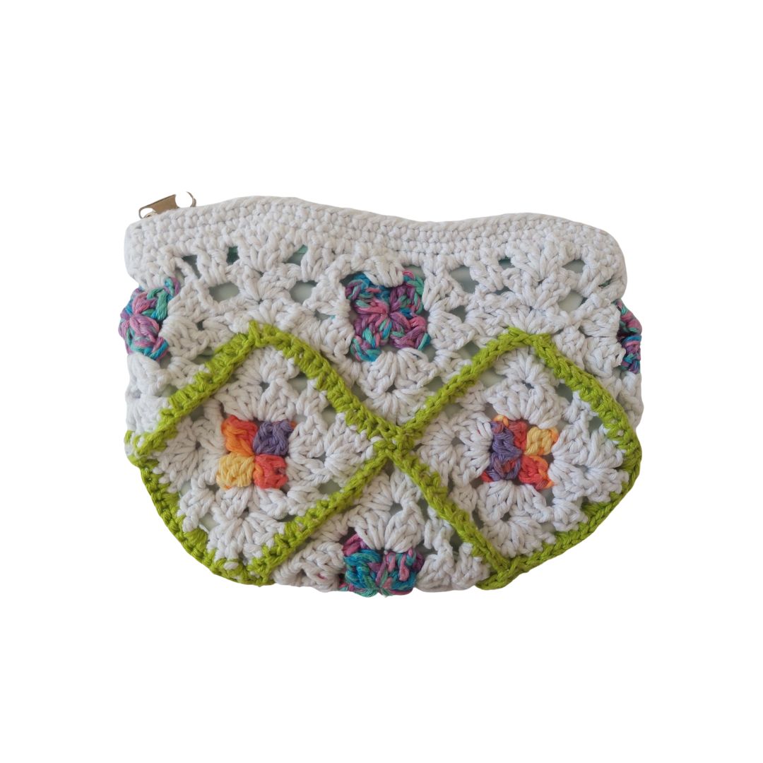 Close-up of the colorful flowers on the crochet pouch